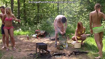 Group youth orgy at a picnic in the woods